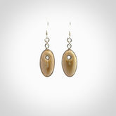Hand carved woolly mammoth tusk earrings. Hand made by NZ Pacific for sale online.